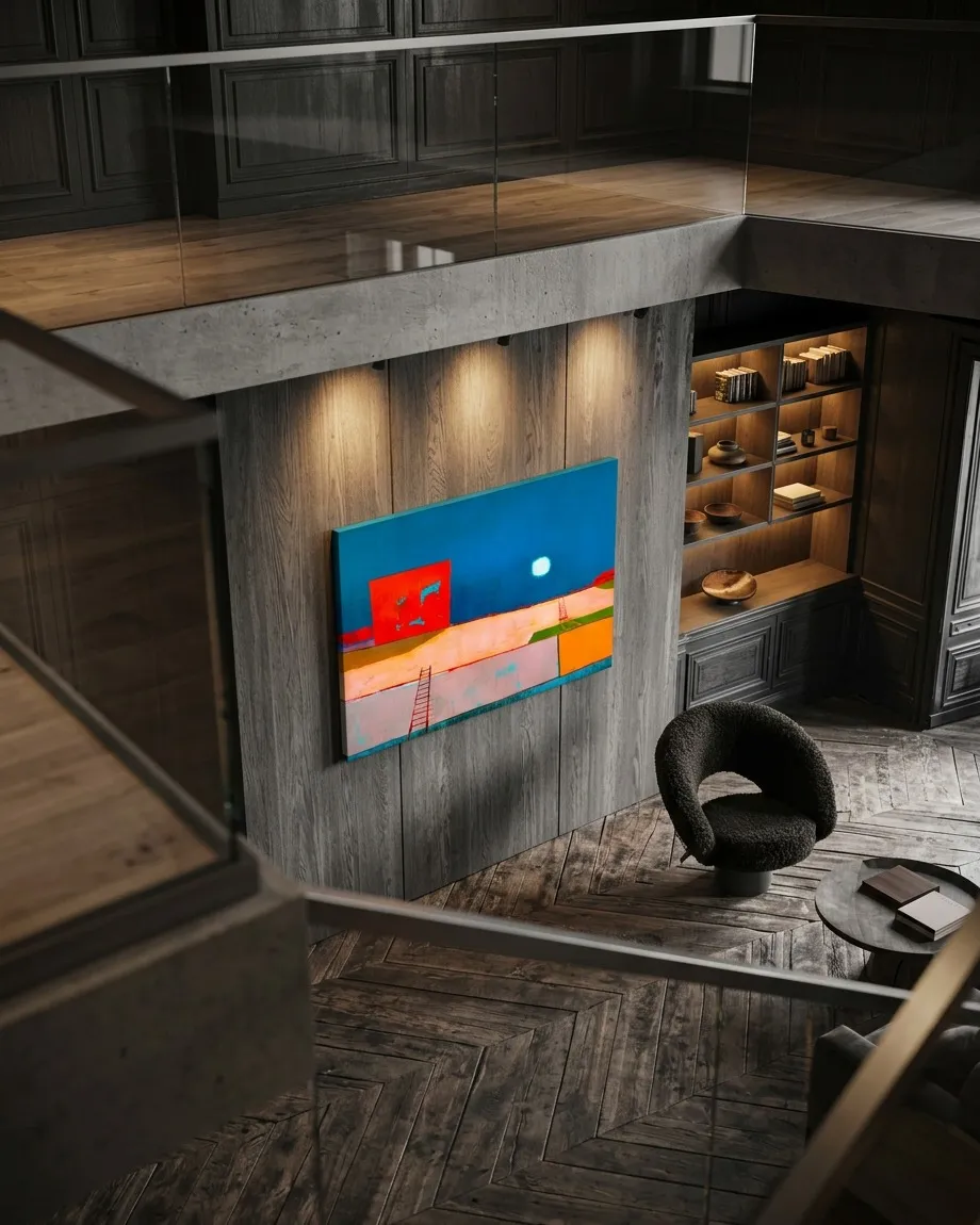 Landscape abstract painting featuring deep blue in the upper section and a crimson block in the center-left. The lower half displays fields of ocher and green with fine horizontal lines and a ladder-like element. A white circle is visible within the blue field. The artwork hangs on a dark wood-paneled wall, illuminated by spotlights, in a room with herringbone wood floors and a built-in bookshelf.