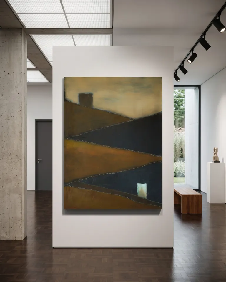 A contemporary art gallery interior displaying a vertical abstract painting titled TENSUM by Maurizio Valch on a central white partition wall. The artwork features diagonal blocks of ochre and dark blue with fine linear incisions and a small bright white rectangle in the lower right corner. The gallery setting includes a raw concrete column on the left, dark wood parquet flooring, a simple wooden bench, and a large window in the background admitting natural light.