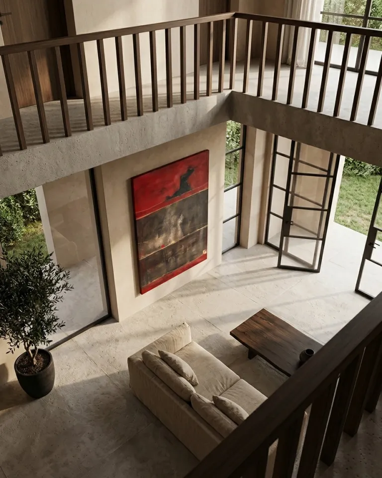 High-angle view from a wooden railing of the abstract painting 'Un solo paso en la ceniza' by Maurizio Valch, exhibited in a large double-height living room with large windows.