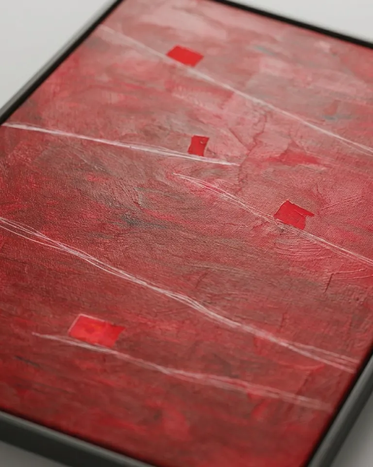 Vertical abstract painting. A dark, textured crimson red color field features multiple white incised lines across its surface. Four small, more intensely red rectangular blocks are distributed within the composition. The close-up view reveals the canvas texture, visible brushstrokes, and the paint's relief.