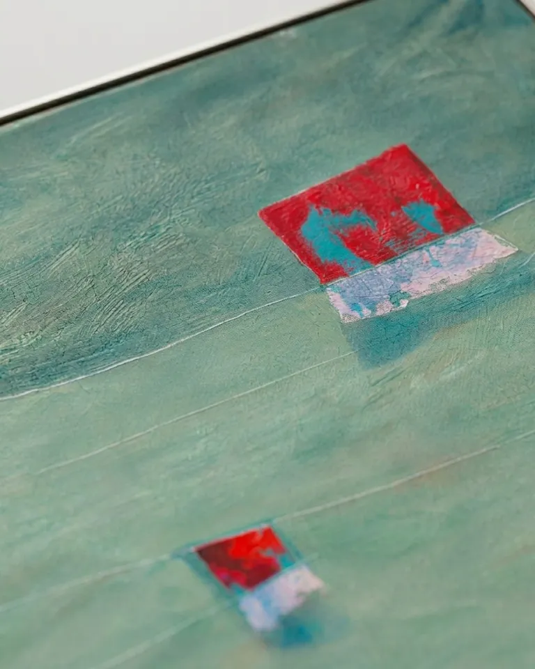 Horizontal abstract painting 'STRATA VIII - TRIA' by Maurizio Valch. Features a vast, textured teal green field with impasto and scraping. Fine incised horizontal lines span the surface. Three rectangular crimson red blocks, one large and two smaller, appear against the background. The blocks have edges with subtle color transitions.