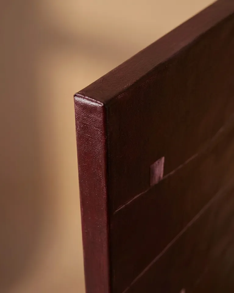Close-up of a corner of a vertical abstract painting. The surface features deep maroon tones, visible canvas texture, and subtle incised horizontal lines. The painted edge continues the artwork's color.