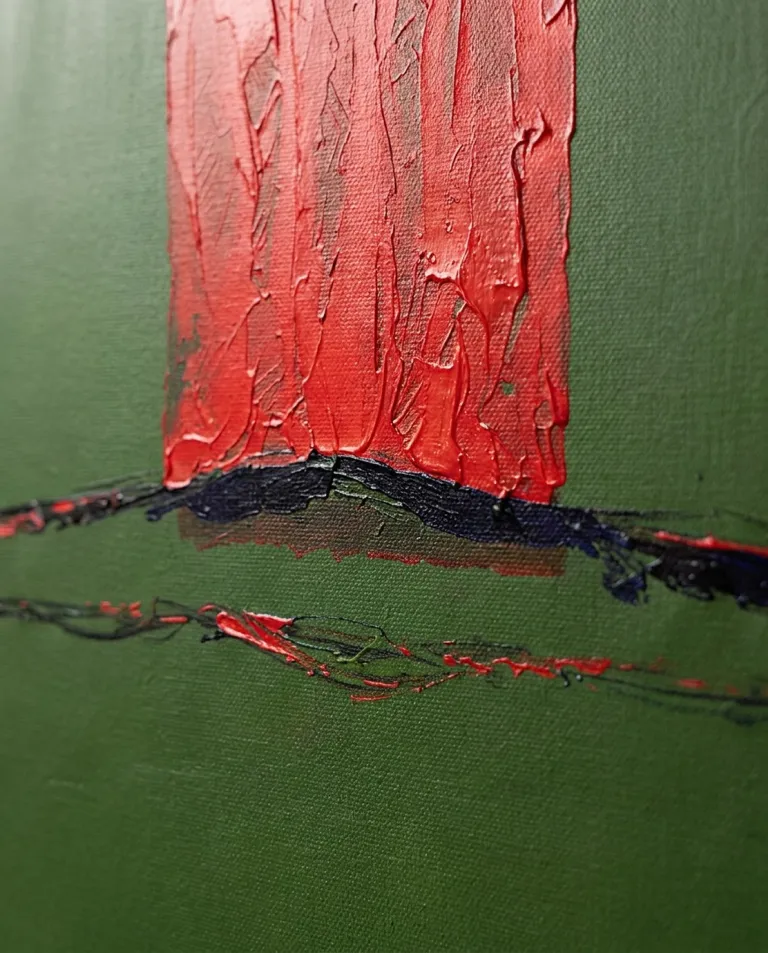 Macro detail shot focused on the junction of the rough crimson block and the central black incision on the olive green background of the painting.